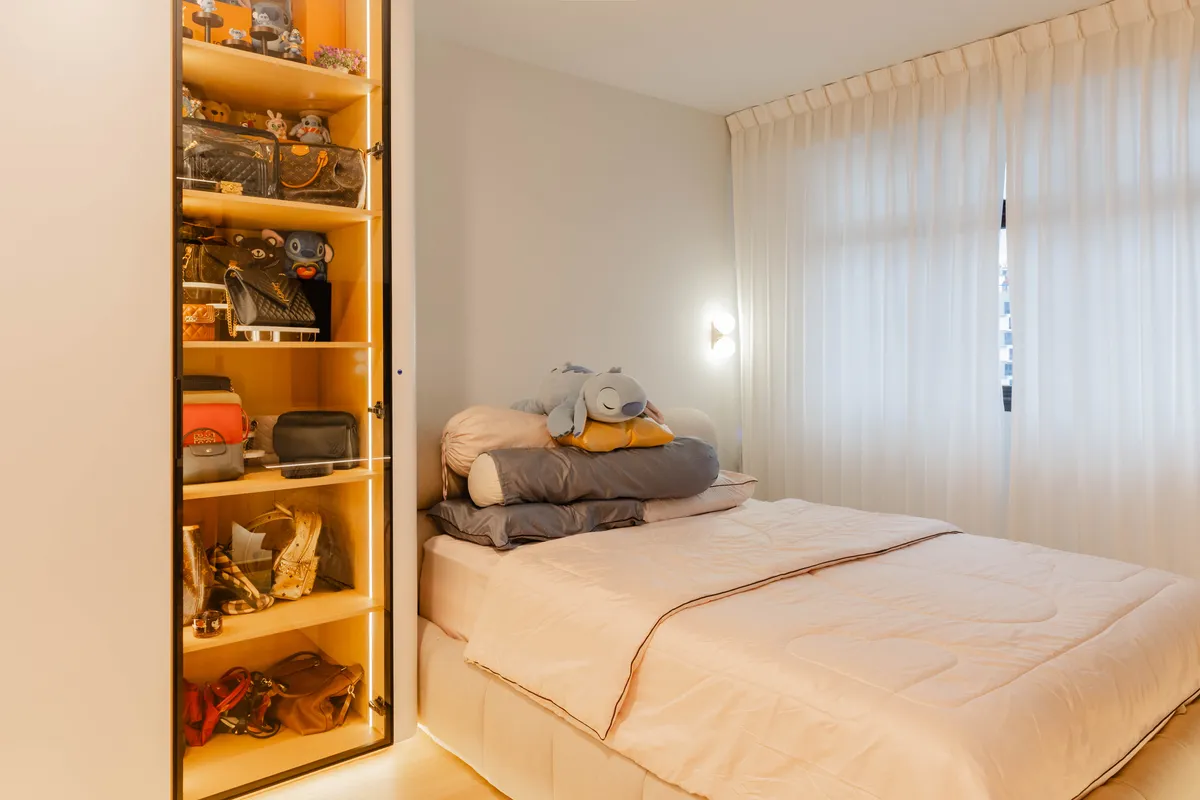 Bedroom display cabinet with warm backlighting at Fernvale St