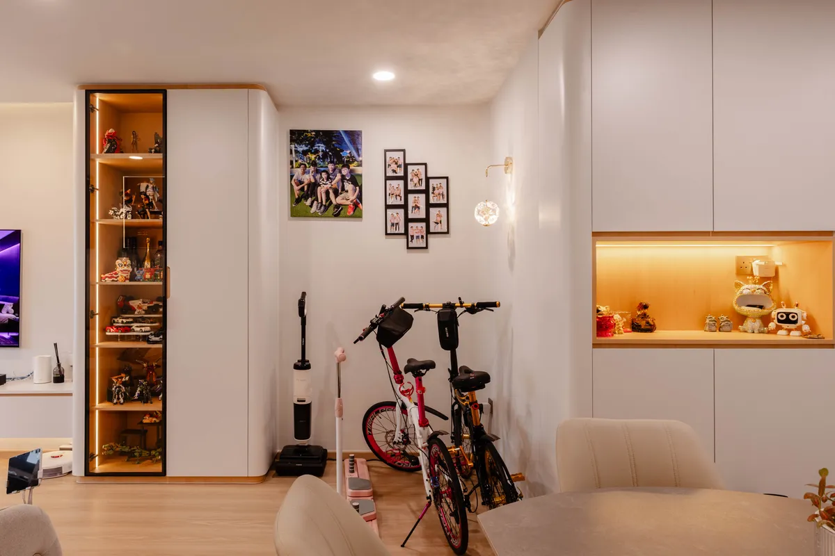 Entry niche with backlit display shelving at Fernvale St