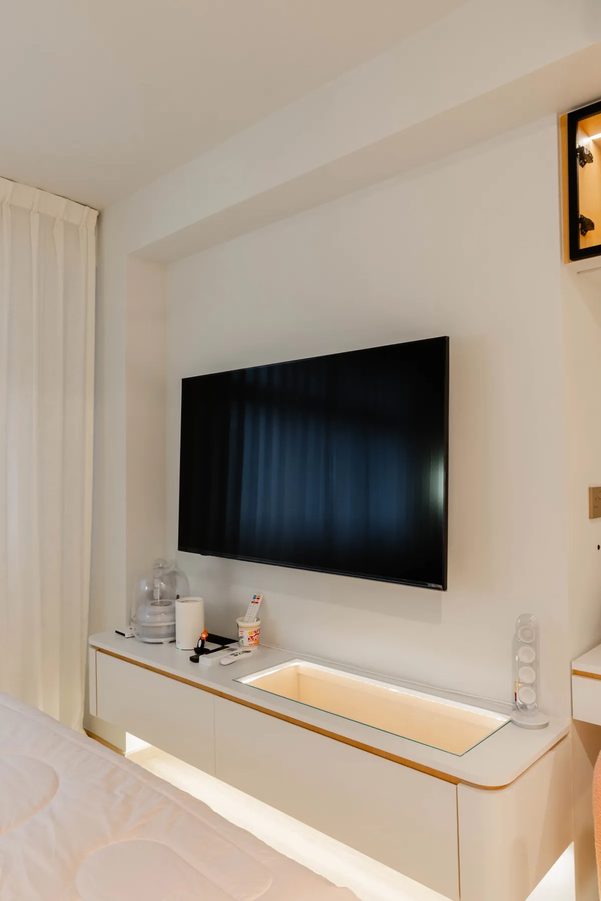 TV wall detail at Fernvale St